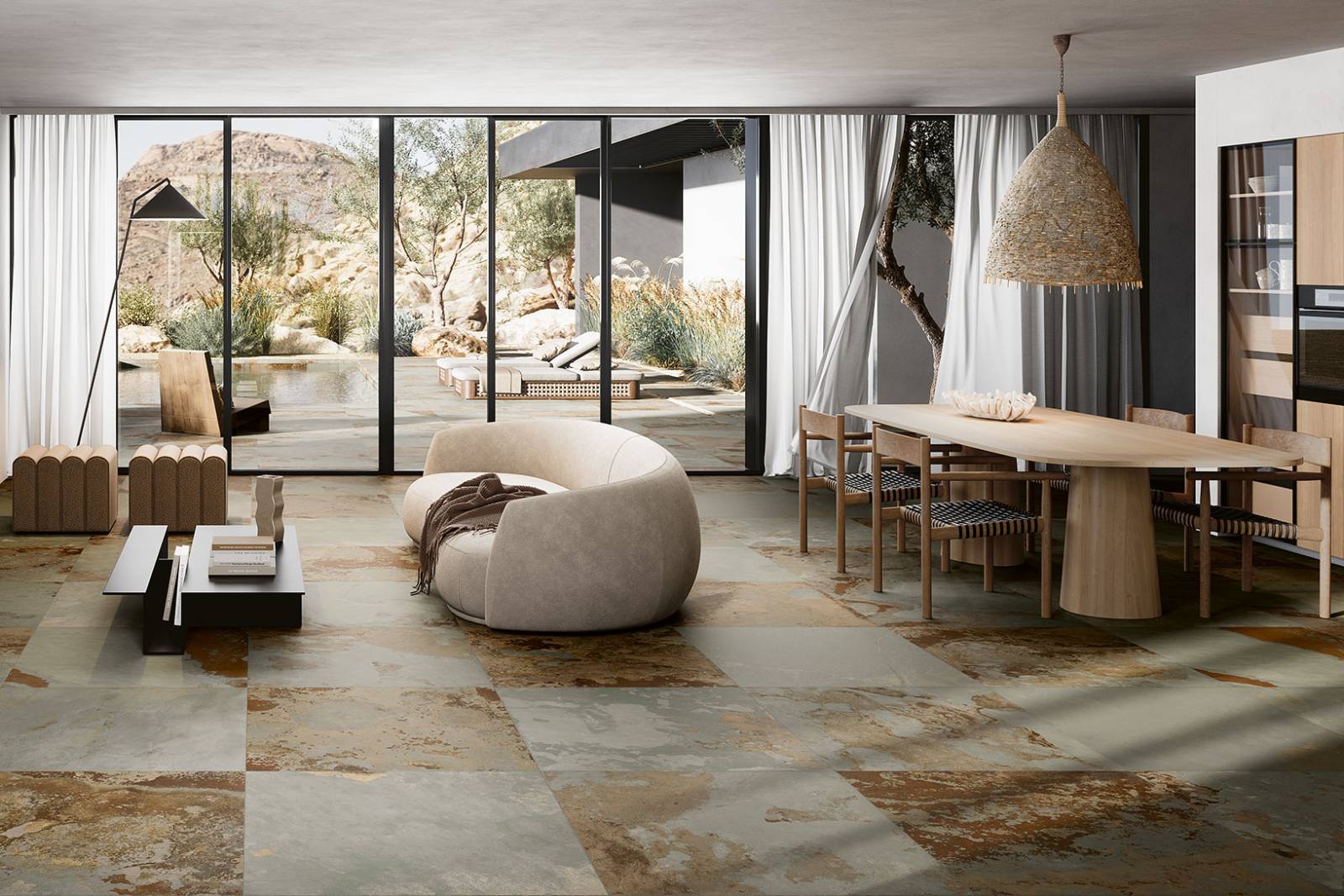 Salon lumineux habillé de carrelage Bali Light Green Coem au sol, mariage parfait entre modernité et touche végétale pour une déco naturelle et apaisante.