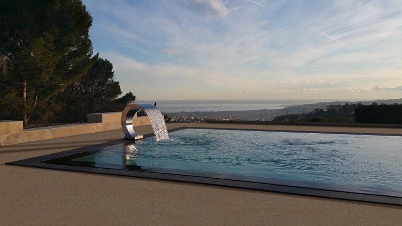 piscine bord miroir réalisée par la compagnie des piscines du languedoc à montelimar 26 drôme
