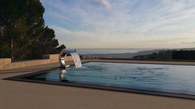 piscine bord miroir réalisée par la compagnie des piscines du languedoc à montelimar 26 drôme